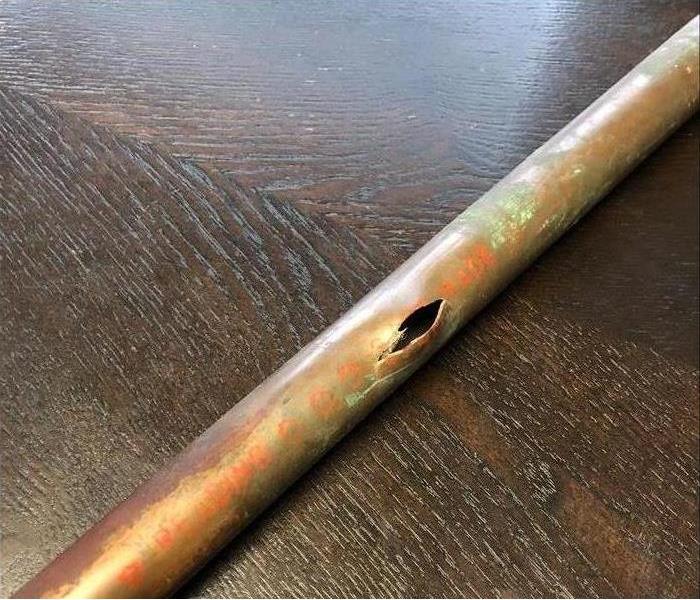 A burst copper pipe