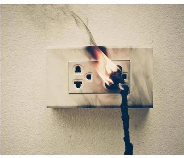 An outlet is burning