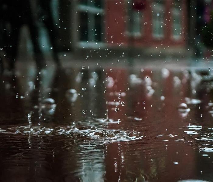 Raindrops fall in a town