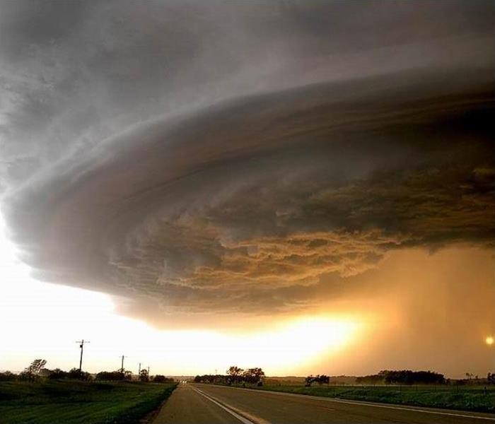 A tornado forms in the sky