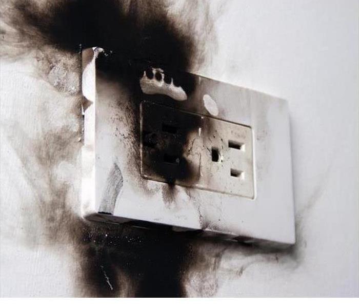 Electrical Outlet Fire Damage
